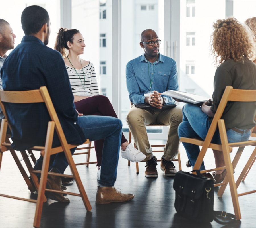 Aspen View Mental Health - gathered round for a meeting 2024 06 28 21 19 40 utc