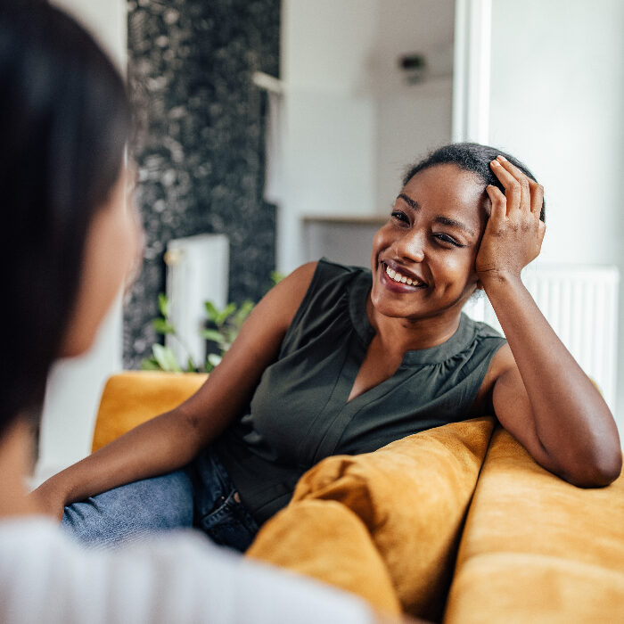 Adult woman, talking to her friend about her day at work. Adult woman, talking to her friend about her day at work.