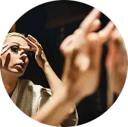 A woman looking in mirror in need of mental health treatment in greeley, colorado.