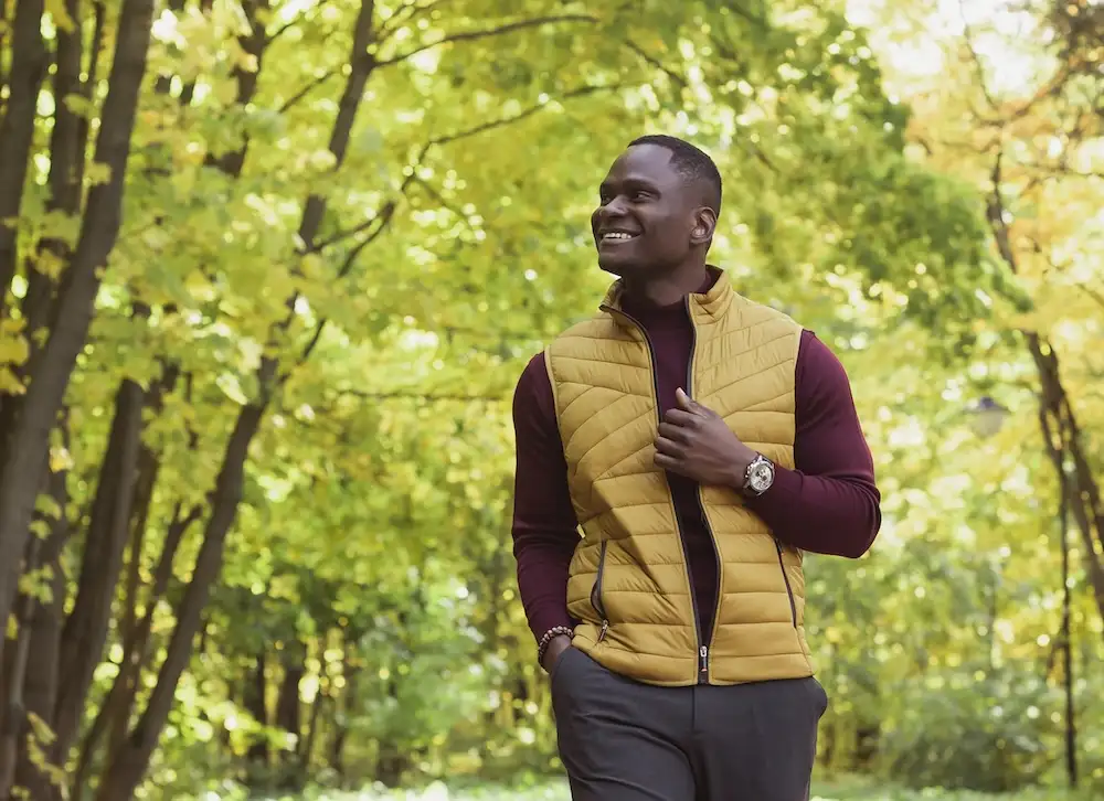 Man in yellow vest walking after his psychiatry appointment in greeley co