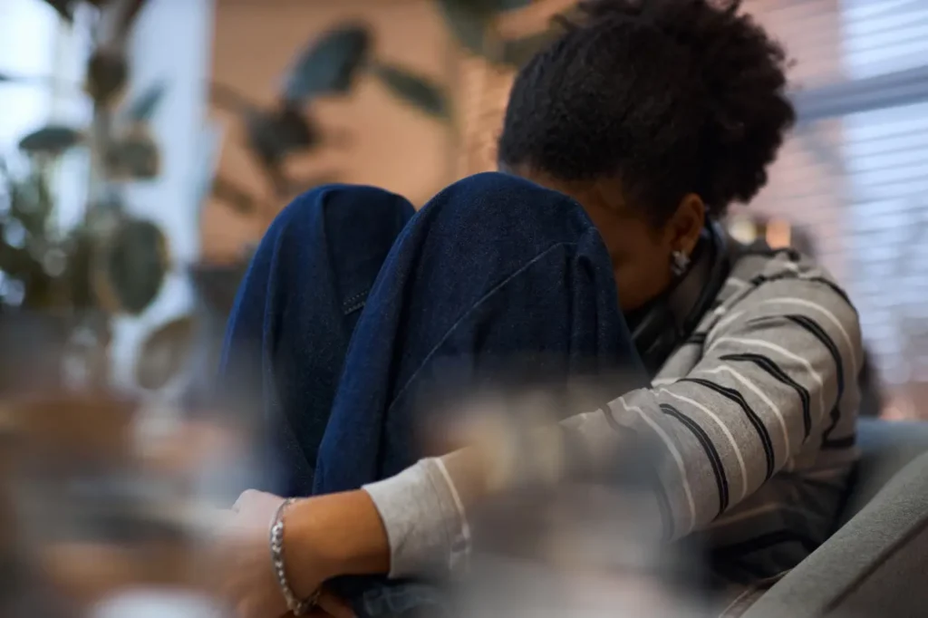Aspen View Mental Health - seated individual embracing knees indoors 2026 03 26 23 59 54 utc Large