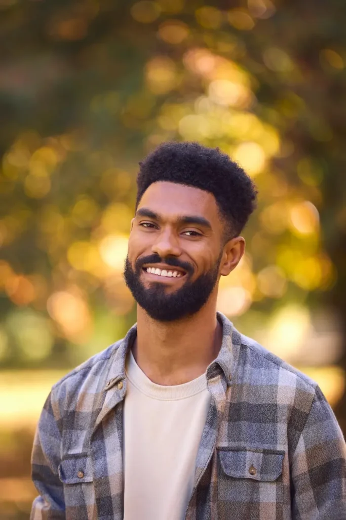 Aspen View Mental Health - smiling man in plaid shirt outdoors portrait 2026 03 10 03 19 01 utc